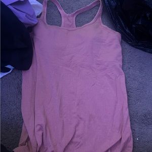 lululemon pink ebb to street size 12 pink tank top